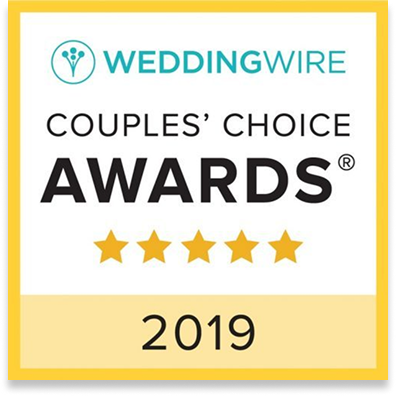 A square badge with a yellow border that reads WeddingWire Couples’ Choice Awards 2019 with five gold stars below “Awards,” showcasing Heitman House as the best Fort Myers wedding venue. A square badge with a yellow border that reads WeddingWire Couples’ Choice Awards 2019 with five gold stars below "Awards," showcasing Heitman House as the best Fort Myers wedding venue.